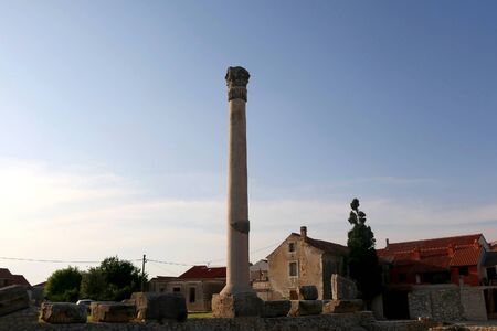 Ruins of ancient Roman temple from first century in small town Nin, Croatia.の写真素材