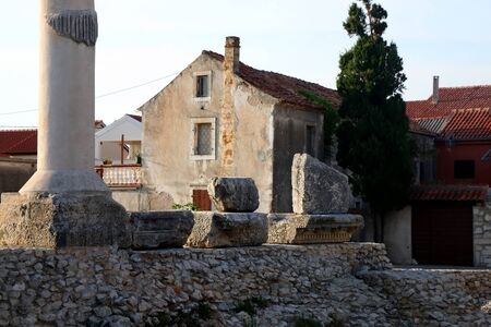 Ruins of ancient Roman temple from first century in small town Nin, Croatia.の写真素材