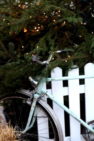 Vintage bike set as a Christmas Decoration outdoor. Selective focus.の写真素材