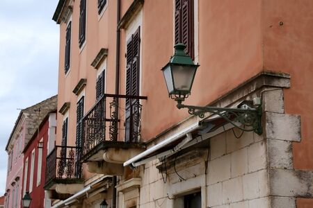 Retro lamp on a traditional colorful Mediterranean building in Stari Grad, on island Hvar, Croatia.の写真素材