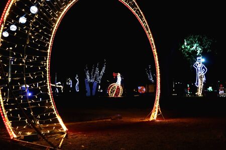 Colorful outdoor Christmas decorations in a park in central Split, Croatia, at night.の写真素材