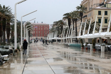 Split, Croatia - February 26, 2018: Riva promenade, landmark in Split, Croatia is covered in snow.のeditorial素材