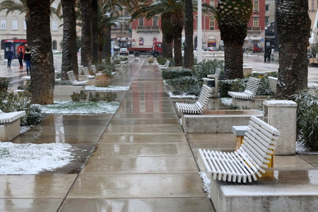 Split, Croatia - February 26, 2018: Riva promenade, landmark in Split, Croatia is covered in snow.のeditorial素材
