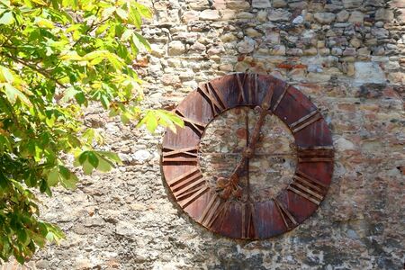 Historic clock, landmark on Kaptol, uptown Zagreb, Croatia. Selective focus.の写真素材