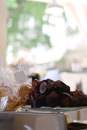 Chocolate muffins in a pastry shop. Selective focus.