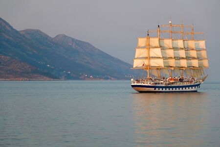 Traditional large sailing boat near Hvar, Croatia at sunset. Selective focus.の写真素材