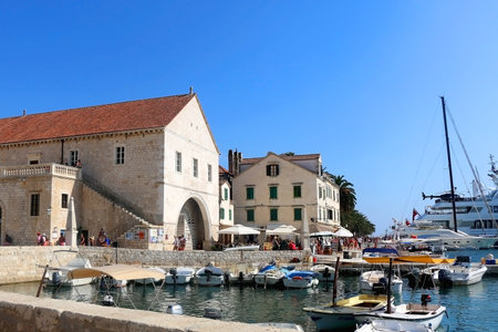 Hvar, Croatia - August 7, 2015: Boats in the port of town Hvar, on island Hvar, Croatia on a sunny...