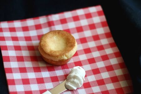 Homemade yorkshire pudding and cream cheese. Selective fcous.