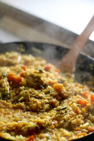 Stir-fry rice with leek, squash and carrot. Selective focus.