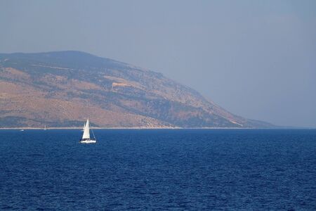 Sailing boat on the sea in southern Dalmatia region in Croatia. Beautiful landscape and bright summer day.の写真素材