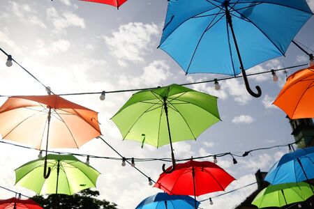 Colorful umbrellas on the street of Zagreb, Croatia. Selective focus.