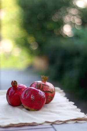 Fresh pomegranates, picked from the garden. Selective focus.の写真素材