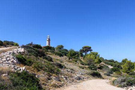 Picturesque lighthouse on the hill. Beautiful landscape on island Lastovo, Croatia.の写真素材