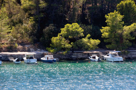 Small fishing boats in Vela Luka, on island Korcula, Croatia.の写真素材