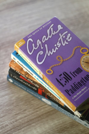 Split, Croatia - April 24, 2021: Stack of classic murder mystery books by Agatha Christie. Selective...