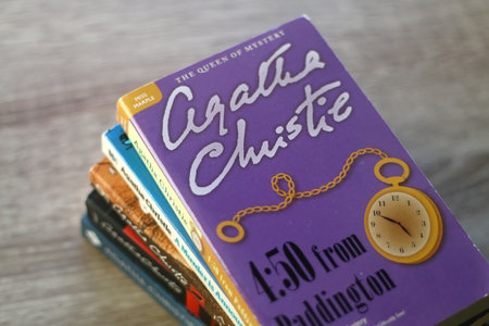 Split, Croatia - April 24, 2021: Stack of classic murder mystery books by Agatha Christie. Selective...