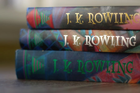 Split, Croatia - April 24, 2021: Stack of classic fantasy books by J. K. Rowling. Selective focus.のeditorial素材