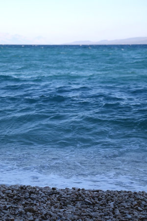 Waves on a beach in Croatia. Selective focus.