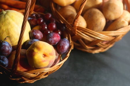 Various seasonal fruit and vegetable on dark background. Selective focus.の写真素材