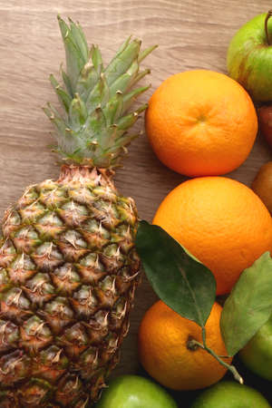 Various healthy fruit and vegetable on wooden background. Top view.の写真素材