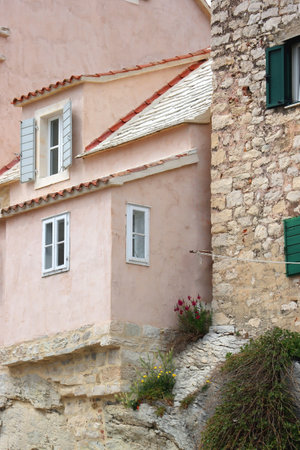 Traditional old Mediterranean houses built on the rocks in Split, Croatia.の写真素材