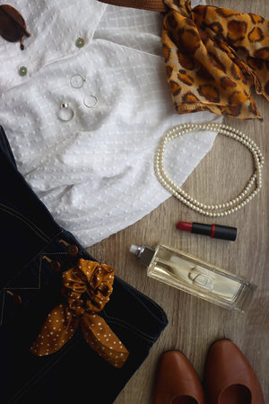 White blouse, denim skirt, brown shoes, vintage bag, leopard print scarf, pearl necklace, scrunchie,...
