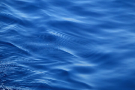 Bright blue sea surface, close-up.