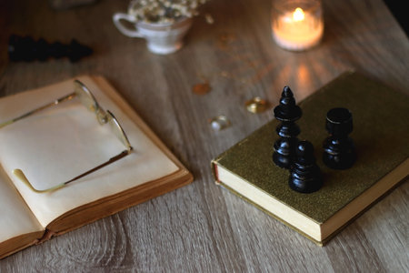 Vintage books, reading glasses, gold pen, hand model, gold jewelry, scented candles, flowers, chess...