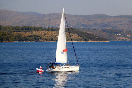 Sailing boat and beautiful Adriatic sea landscape in Croatia.