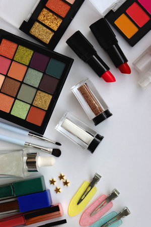 Various colorful beauty products on white background. Top view.の写真素材