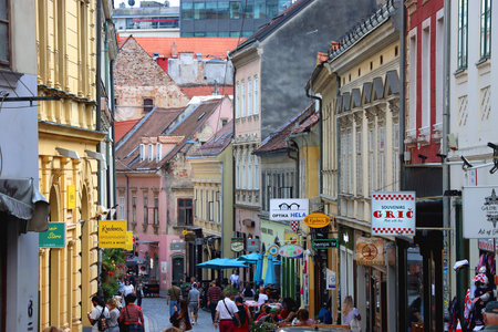 Zagreb, Croatia - May 13, 2022: Locals and tourists are enjoying colorful architecture and cosy atmosphere in Radiceva Street in Zagreb, Croatia.のeditorial素材