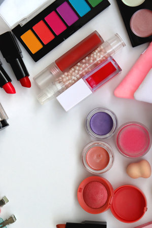 Various colorful beauty products on white background. Top view.の写真素材