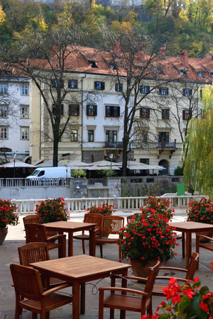 Picturesque historical buildings in central Ljubljana, capital of Slovenia. Autumnal foliage on the trees.の写真素材