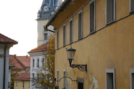 Picturesque historical buildings in central Ljubljana, capital of Slovenia. Autumnal foliage on the trees.の写真素材