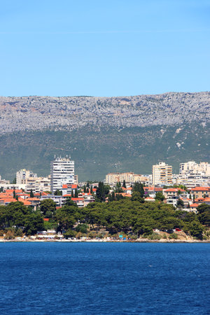 Contemporary buildings, gardens and beaches at the waterfront in Split, Croatia. View of Split from the boat.の写真素材