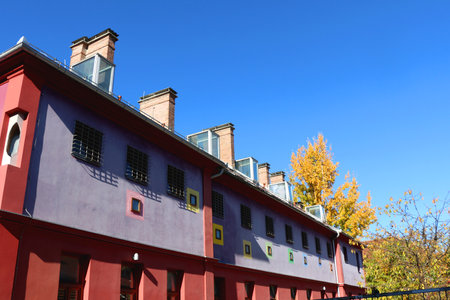Picturesque historical buildings in central Ljubljana, capital of Slovenia. Autumnal foliage on the trees.の写真素材