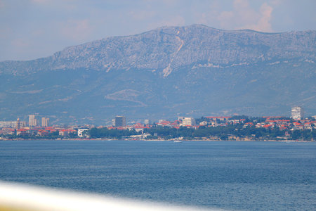 Contemporary buildings, gardens and beaches at the waterfront in Split, Croatia. View of Split from the boat.の写真素材