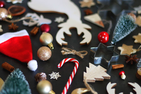 Various Christmas decorations in neutral colors on dark background. Selective focus.の写真素材