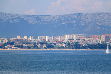 Contemporary buildings, gardens and beaches at the waterfront in Split, Croatia. View of Split from the boat.の写真素材