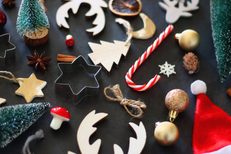 Various Christmas decorations in neutral colors on dark background. Selective focus.の写真素材