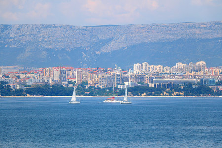 Contemporary buildings, gardens and beaches at the waterfront in Split, Croatia. View of Split from the boat.の写真素材