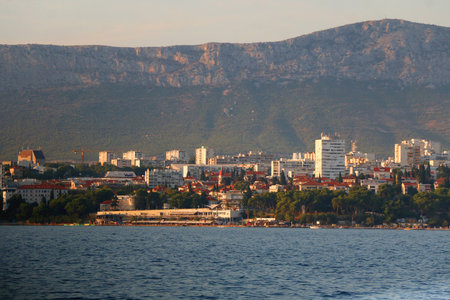 Contemporary buildings, gardens and beaches at the waterfront in Split, Croatia. View of Split from the boat.の写真素材
