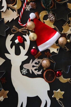 Various Christmas decorations in neutral colors on dark background. Top view.の写真素材