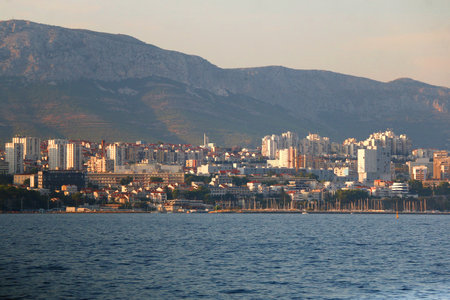 Contemporary buildings, gardens and beaches at the waterfront in Split, Croatia. View of Split from the boat.の写真素材