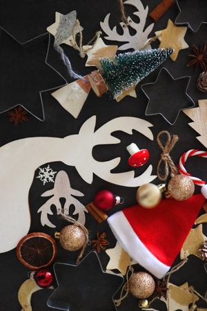 Various Christmas decorations in neutral colors on dark background. Top view.の写真素材