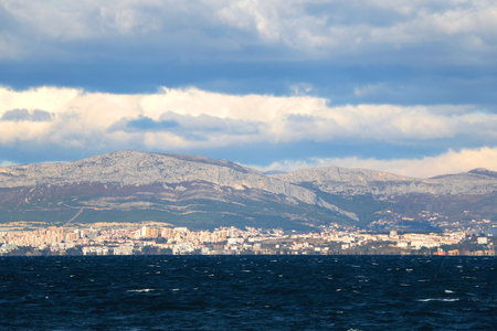 Contemporary buildings, gardens and beaches at the waterfront in Split, Croatia. View of Split from the boat.の写真素材