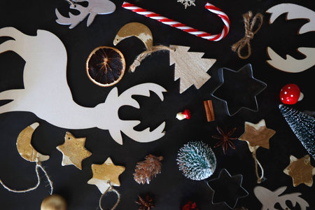 Various Christmas decorations in neutral colors on dark background. Top view.の写真素材