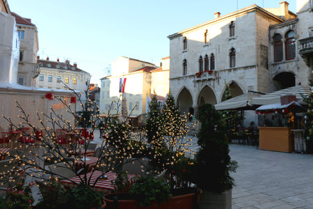 Christmas decorations and historical buildings on People's Square in Split, Croatia. Sunny winter day in Croatia.の写真素材