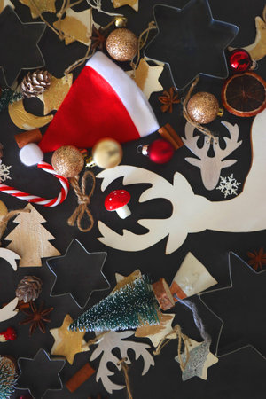 Various Christmas decorations in neutral colors on dark background. Top view.の写真素材