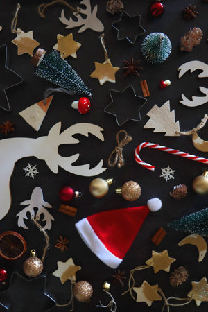 Various Christmas decorations in neutral colors on dark background. Top view.の写真素材
